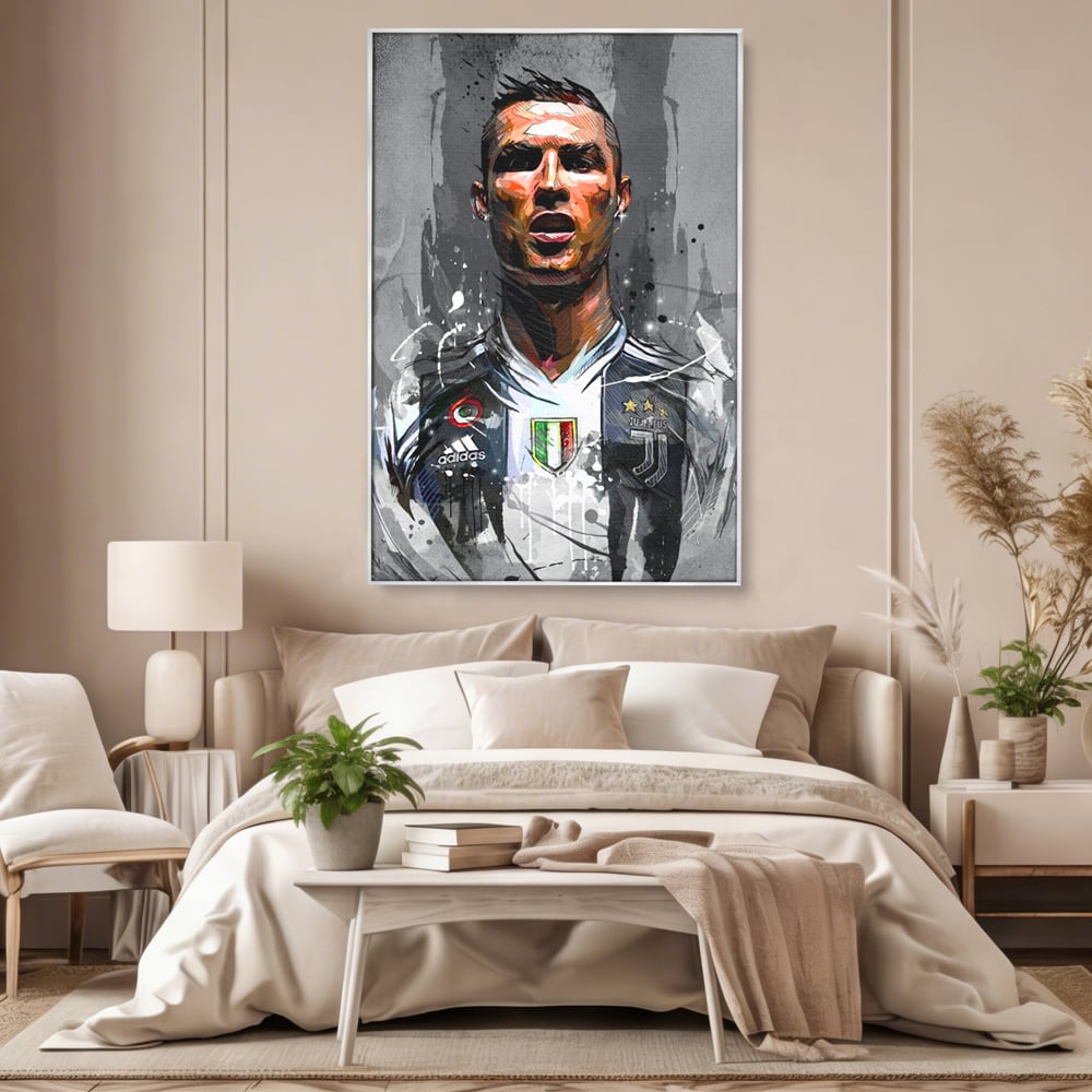 Tablou canvas cu tablou portret cristiano ronaldo juventus, in rama de aluminiu argintiu, pe perete intr-un dormitor